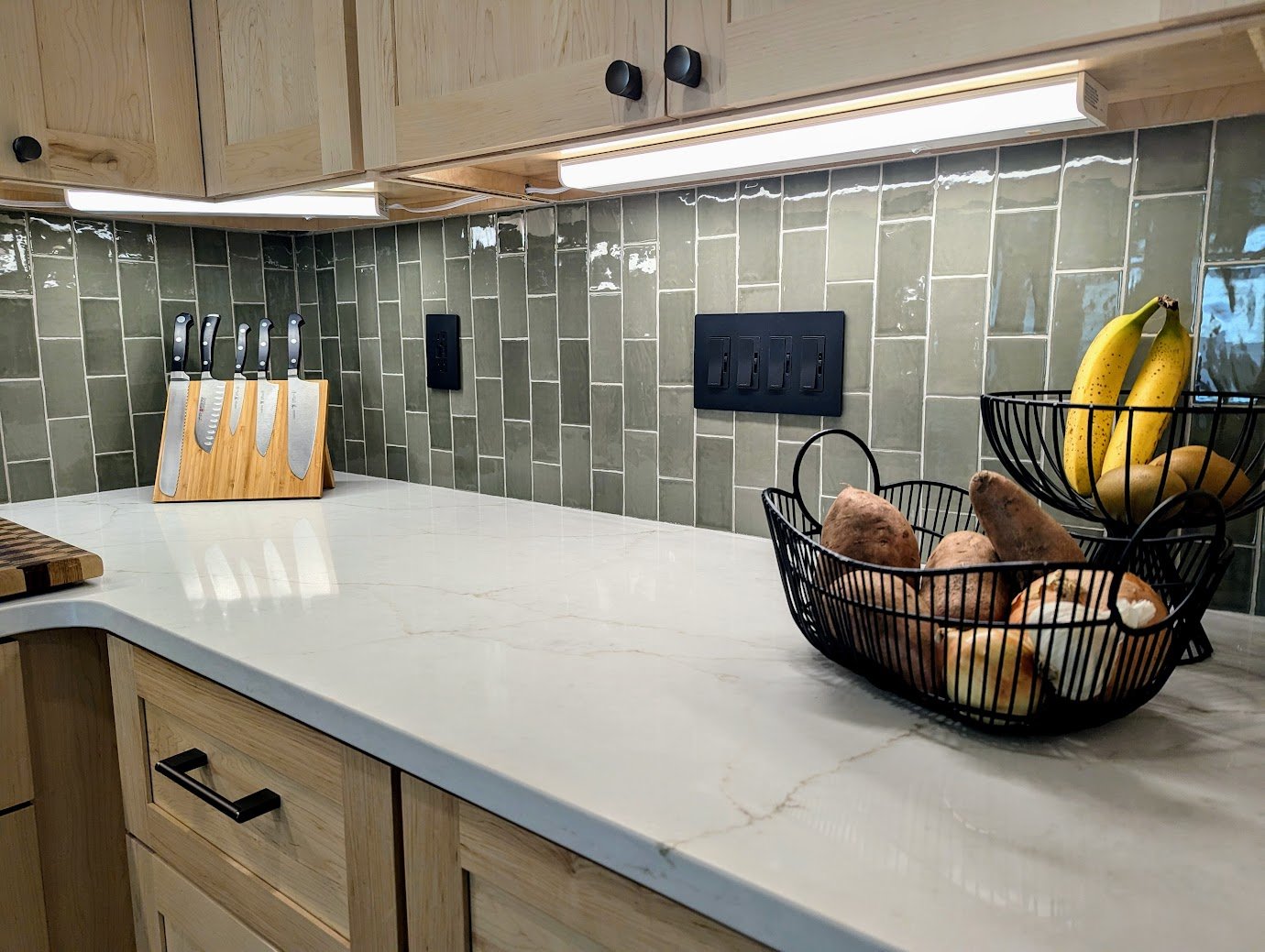 Pittsburgh Quartz Coutertops with Modern Vertical Light Green Tile Backsplash